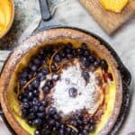 dutch-baby-pancake-with-blueberries-in-a-cast-iron-pan