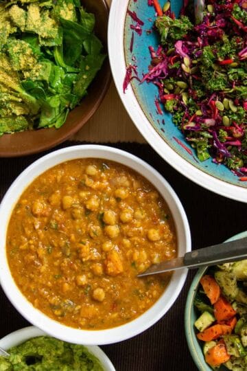 An assortment of toppings for a baked potato party