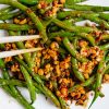 Sweet sambal green beans tossed with crunchy peanuts