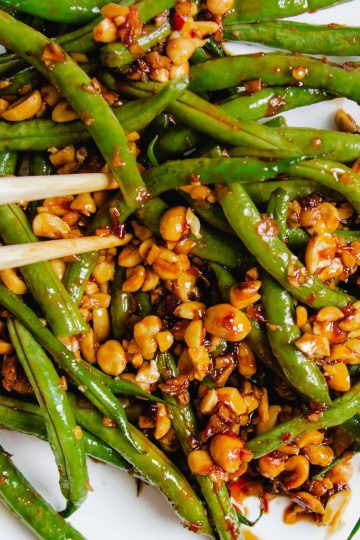 Sweet sambal green beans tossed with crunchy peanuts