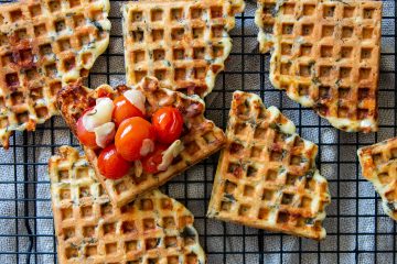 Spinach waffles with cherry tomatoes