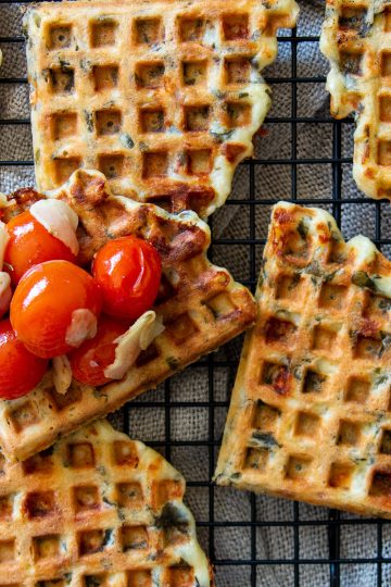 Spinach waffles with cherry tomatoes