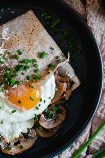 Savoury buckwheat crepes with creamy mushrooms and a fried egg