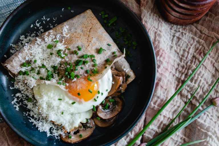 Savoury buckwheat crepes with creamy mushrooms and a fried egg