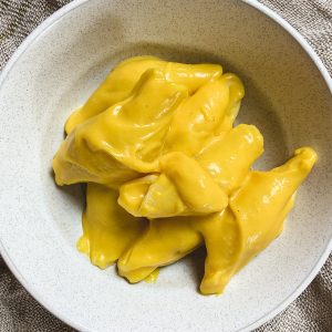 creamy butternut squash mac and cheese in a bowl