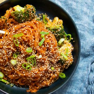 Spicy Creamy Gochujang Noodles With Broccoli And Sesame Seeds
