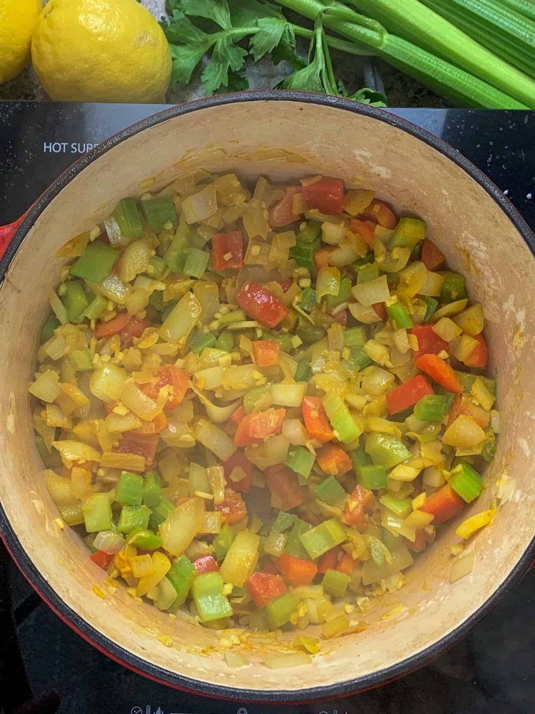 vegetables sweating in a dutch oven
