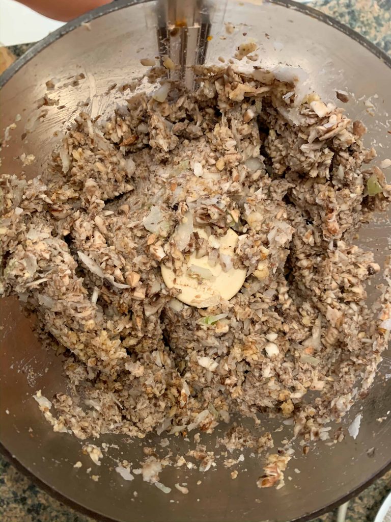 chopped mushroom, walnut, and onion mixture in food processor.