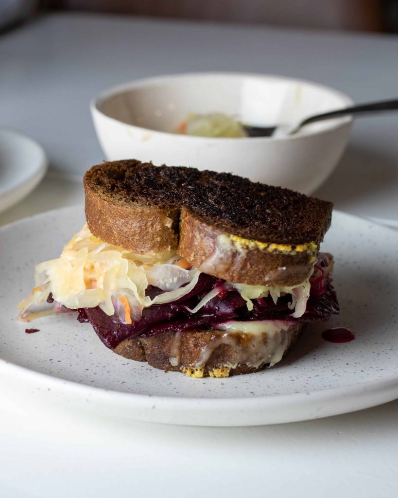 beet sandwich on a plate.