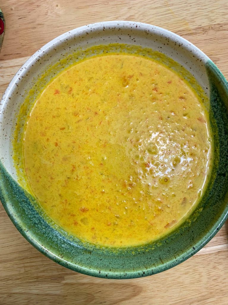 Carrot tahini soup in bowl.