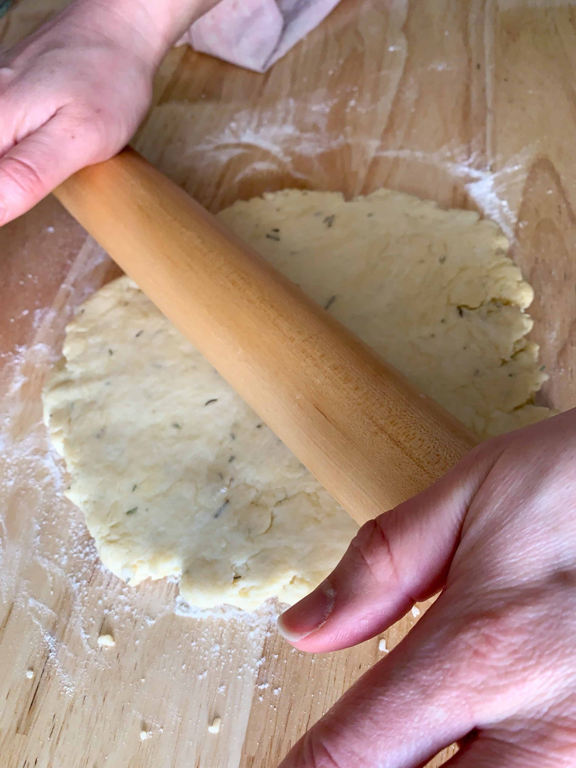 rolling out the biscuit dough.
