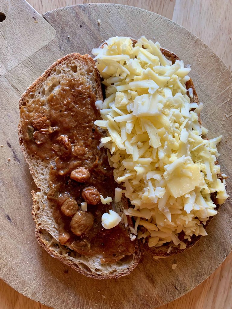 grated cheese and chutney on bread.