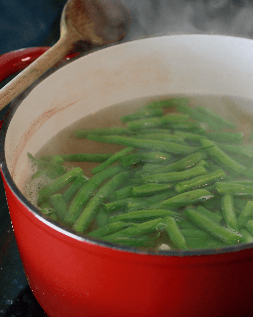 boiling green beans and pasta.