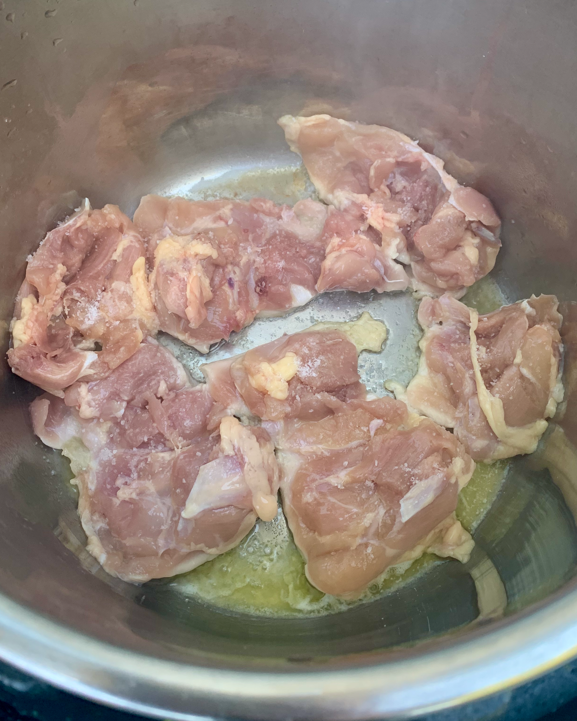 chicken thighs searing in instant pot.