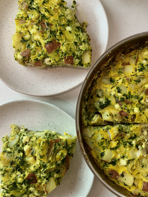 Cottage cheese frittata portioned onto two plates.