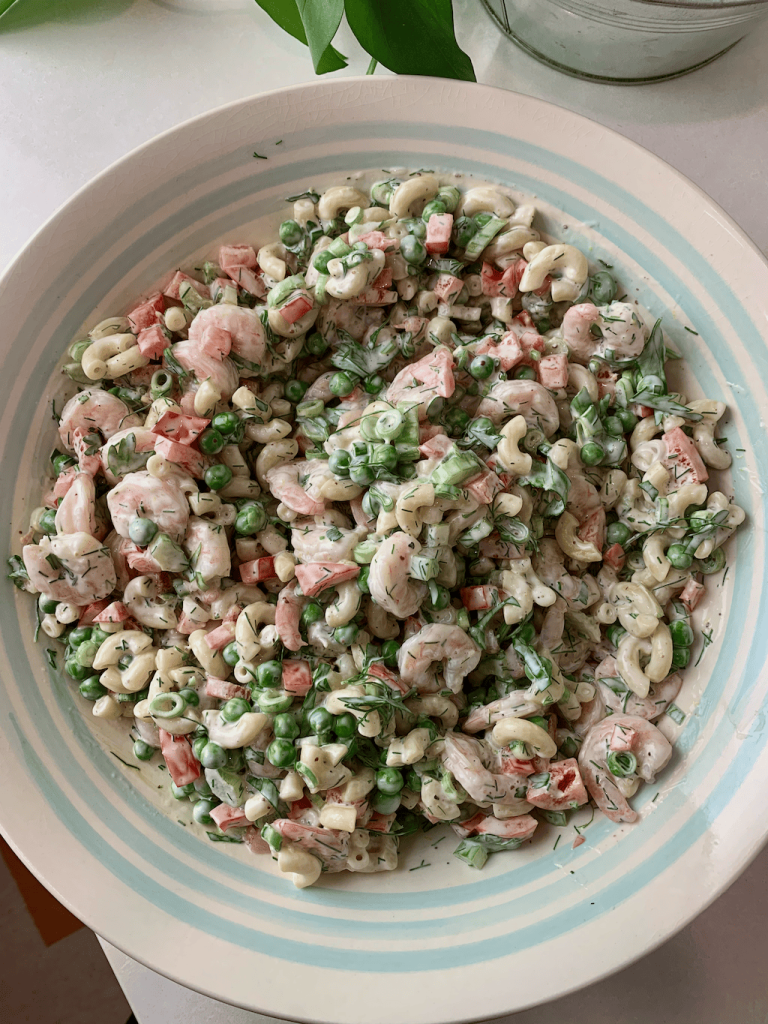 The finished shrimp macaroni salad in a bowl.