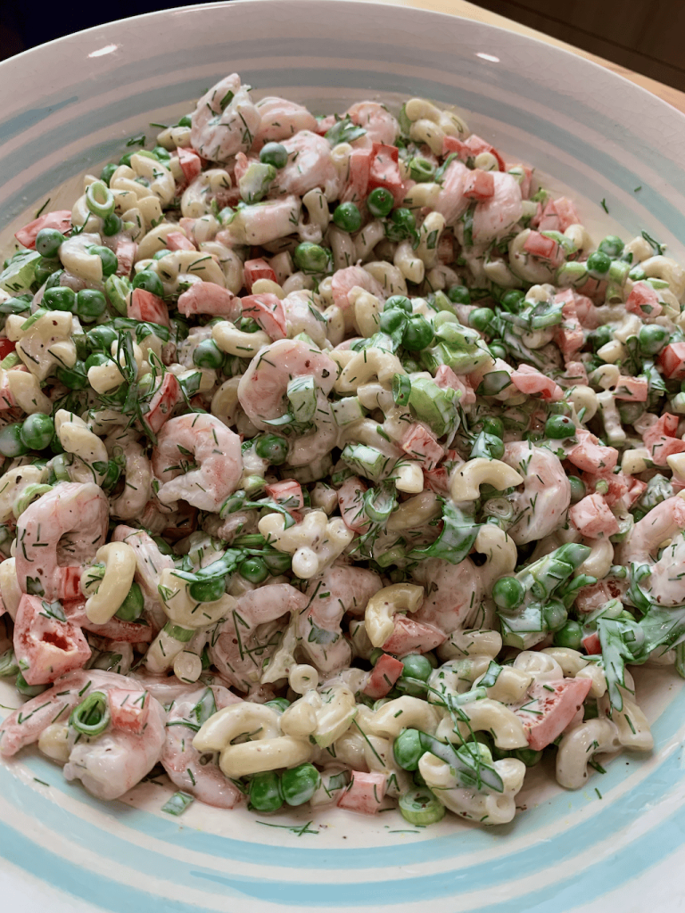 Close up of the shrimp macaroni salad in a bowl.
