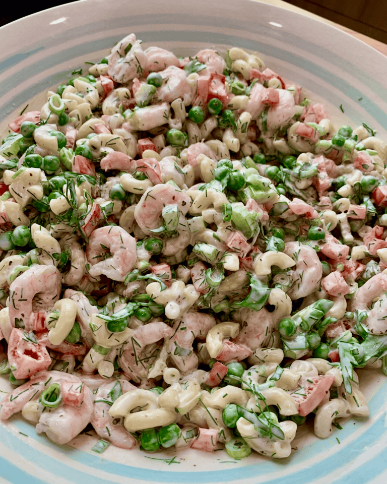 Close up of the shrimp macaroni salad in a bowl.