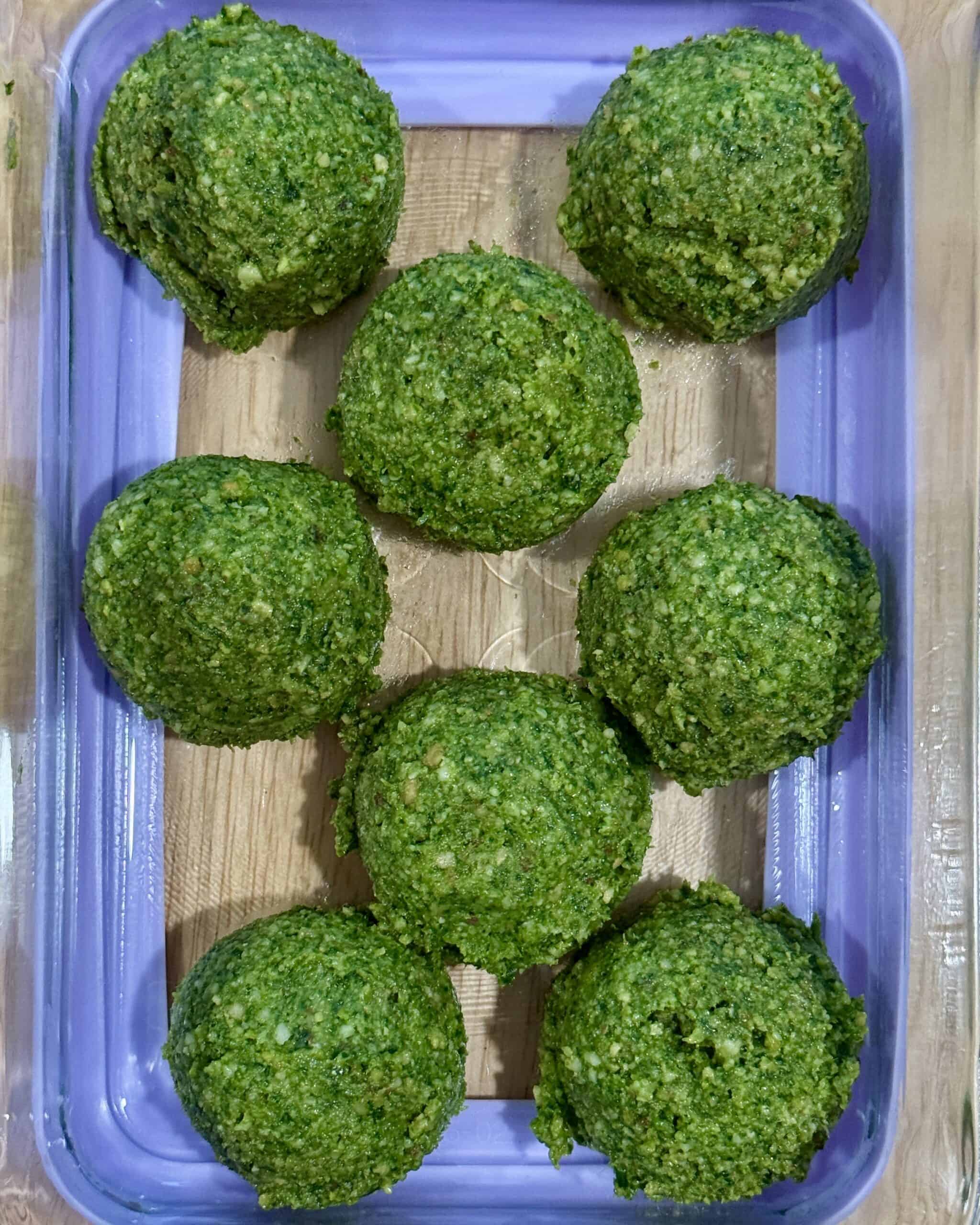 Scoops of radish greens pesto, ready to preserve in the freezer.