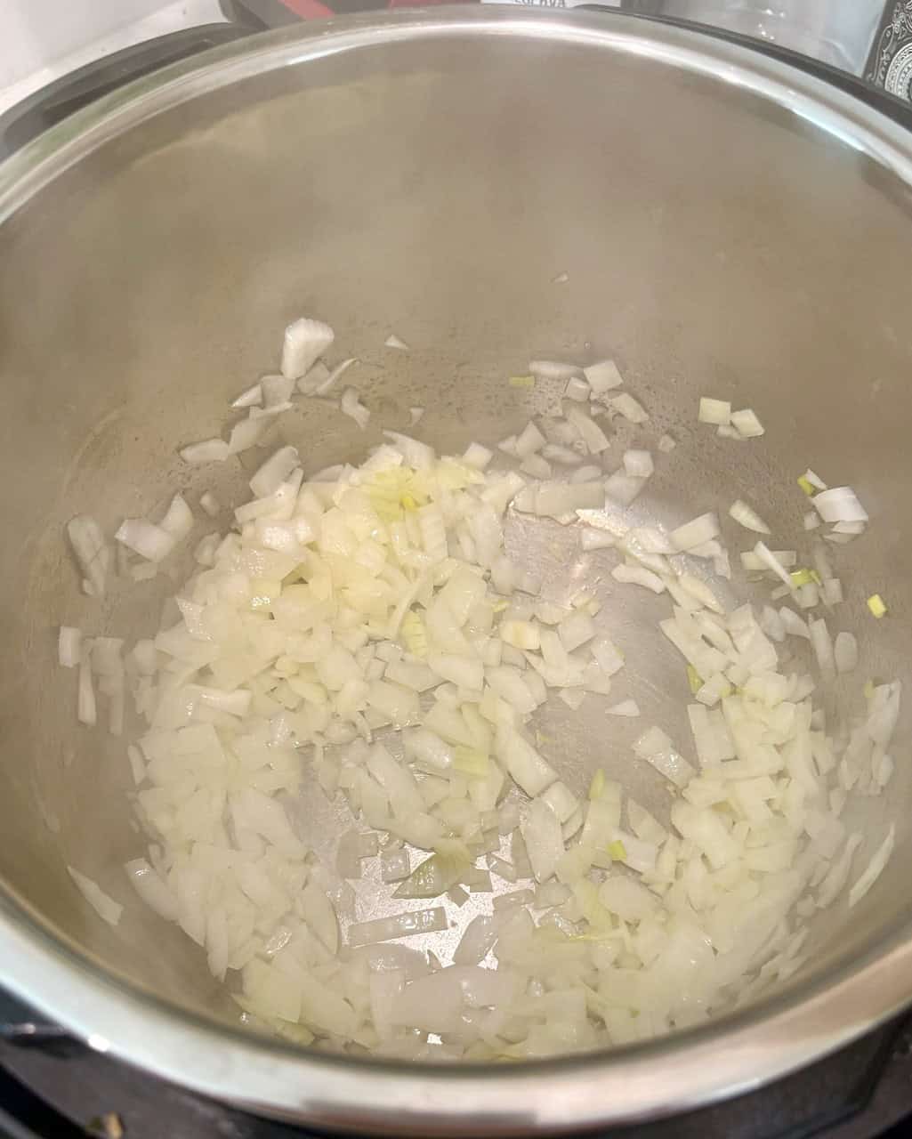 Sautéed onions and garlic in an instant pot.