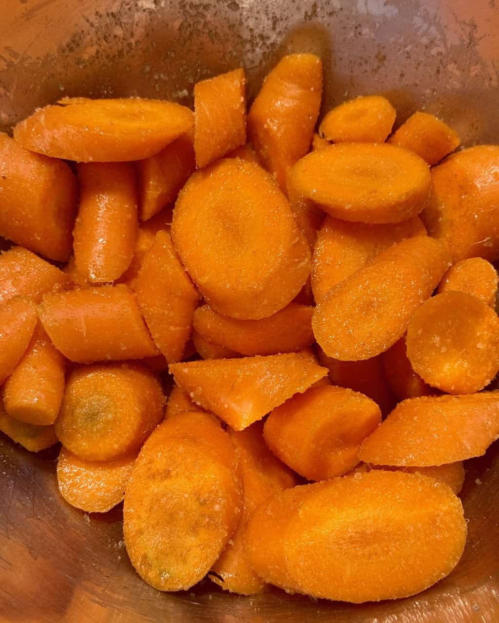 Chopped roasted carrots prepared for a creamy dip recipe.