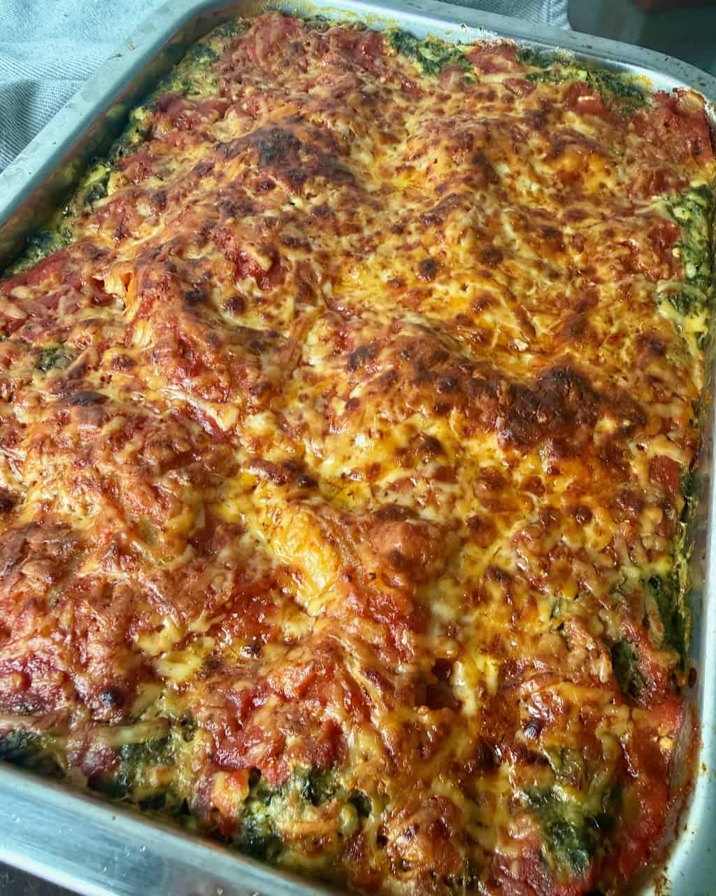 A full pan of finished lasagna, straight out of the oven.