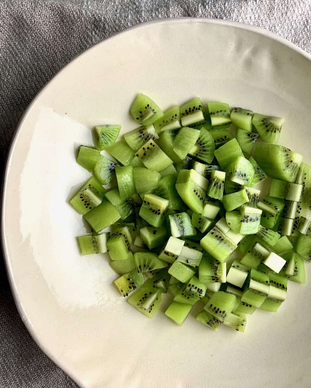 chopped kiwi in a bowl
