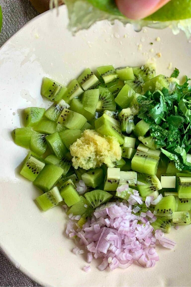 kiwi salsa ingredients in a bowl.