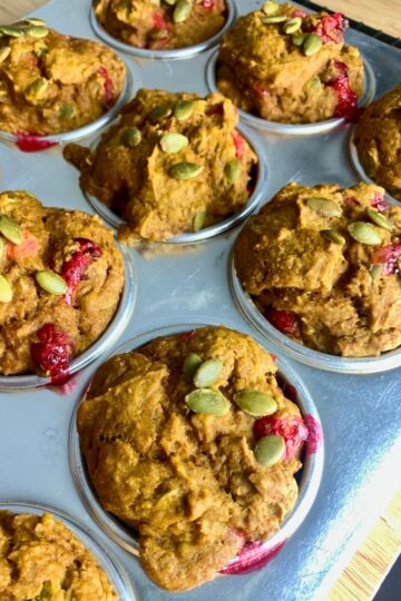 Close-up of the pumpkin muffins, cooling in the tin.
