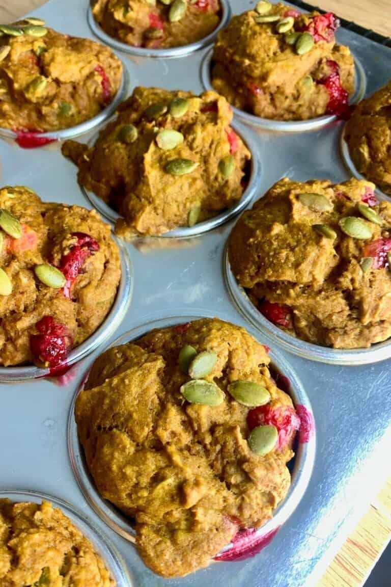 Close-up of the pumpkin muffins, cooling in the tin.