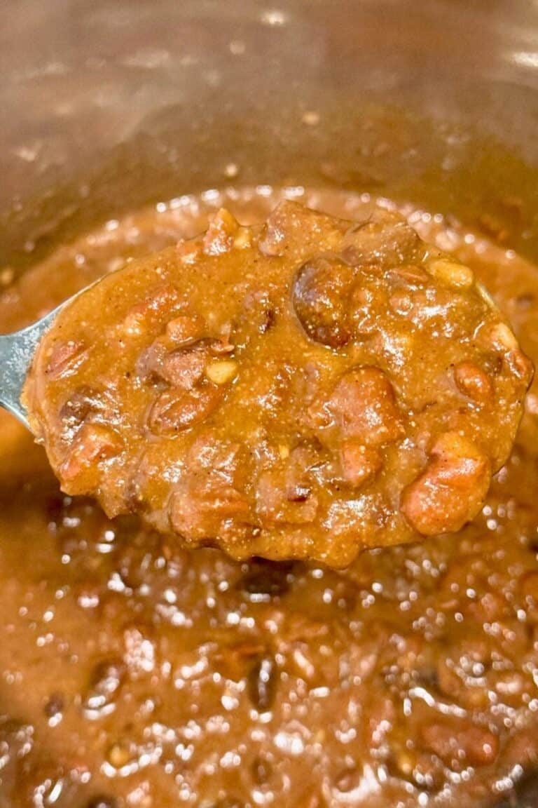 Big spoonful of refried beans.