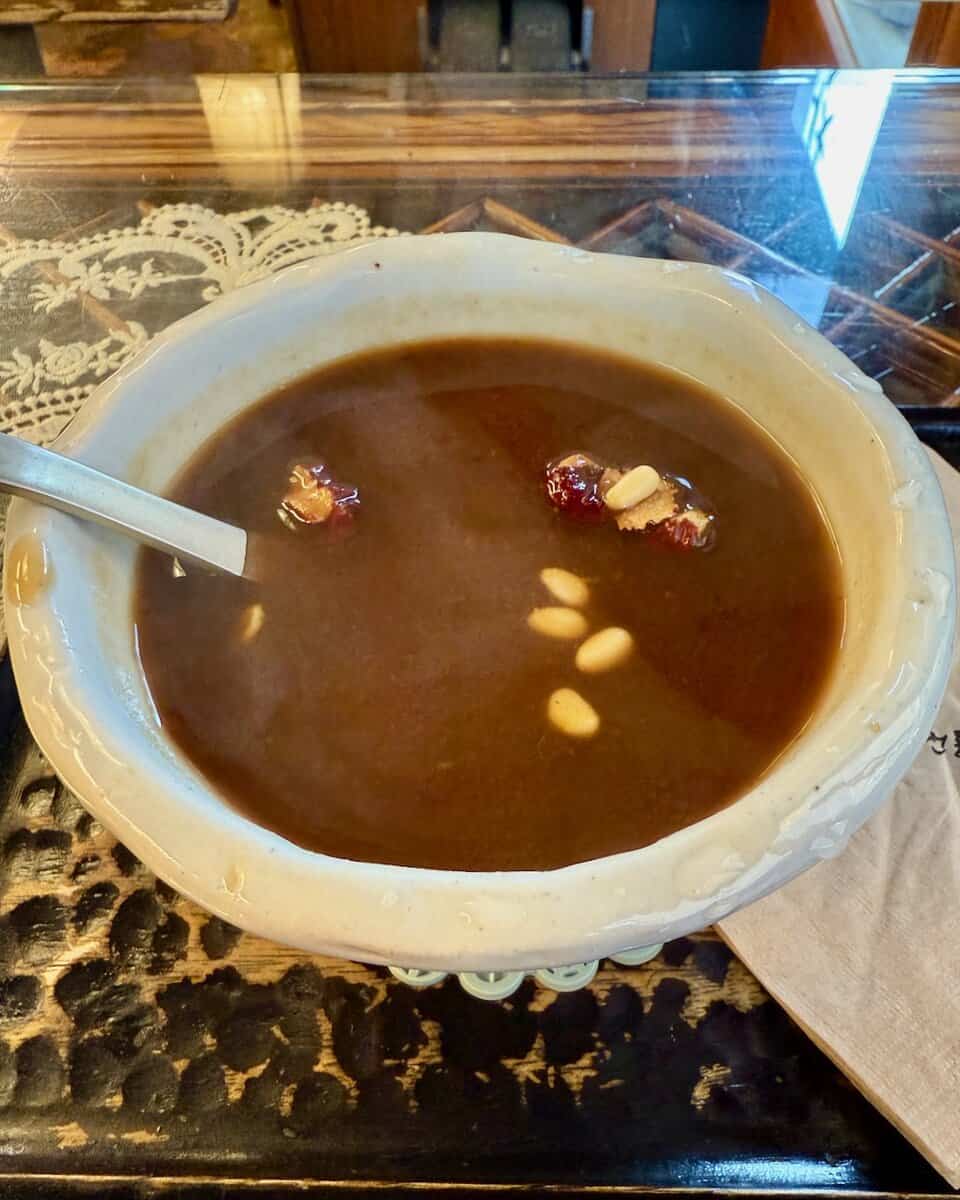 Jujube tea in a white bowl.