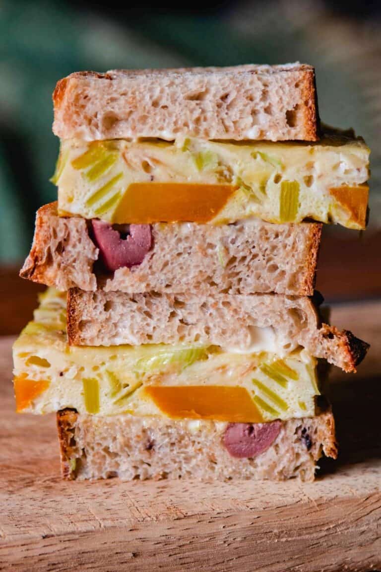 Baked omelette sandwich on rustic olive bread.