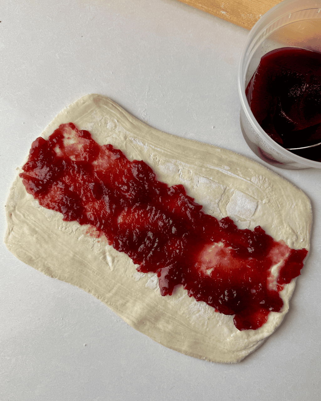 Delicious turkey sausage rolls with cranberry sauce ready to bake or serve. Perfect for holiday appe.